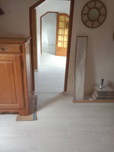 Pose d'un parquet stratifié dans une maison à Harfleur