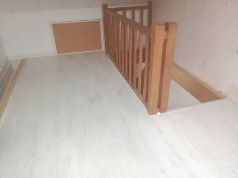 Pose d'un parquet stratifié dans une maison à Harfleur