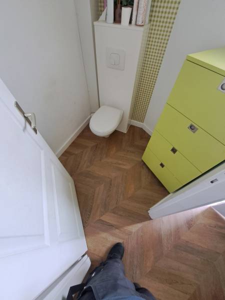 Pose d'un parquet en point de hongrie dans une maison à Gainneville