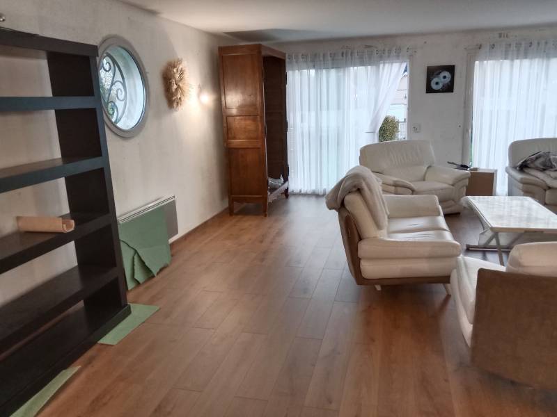 Pose d'un parquet stratifié dans une maison à Etretat